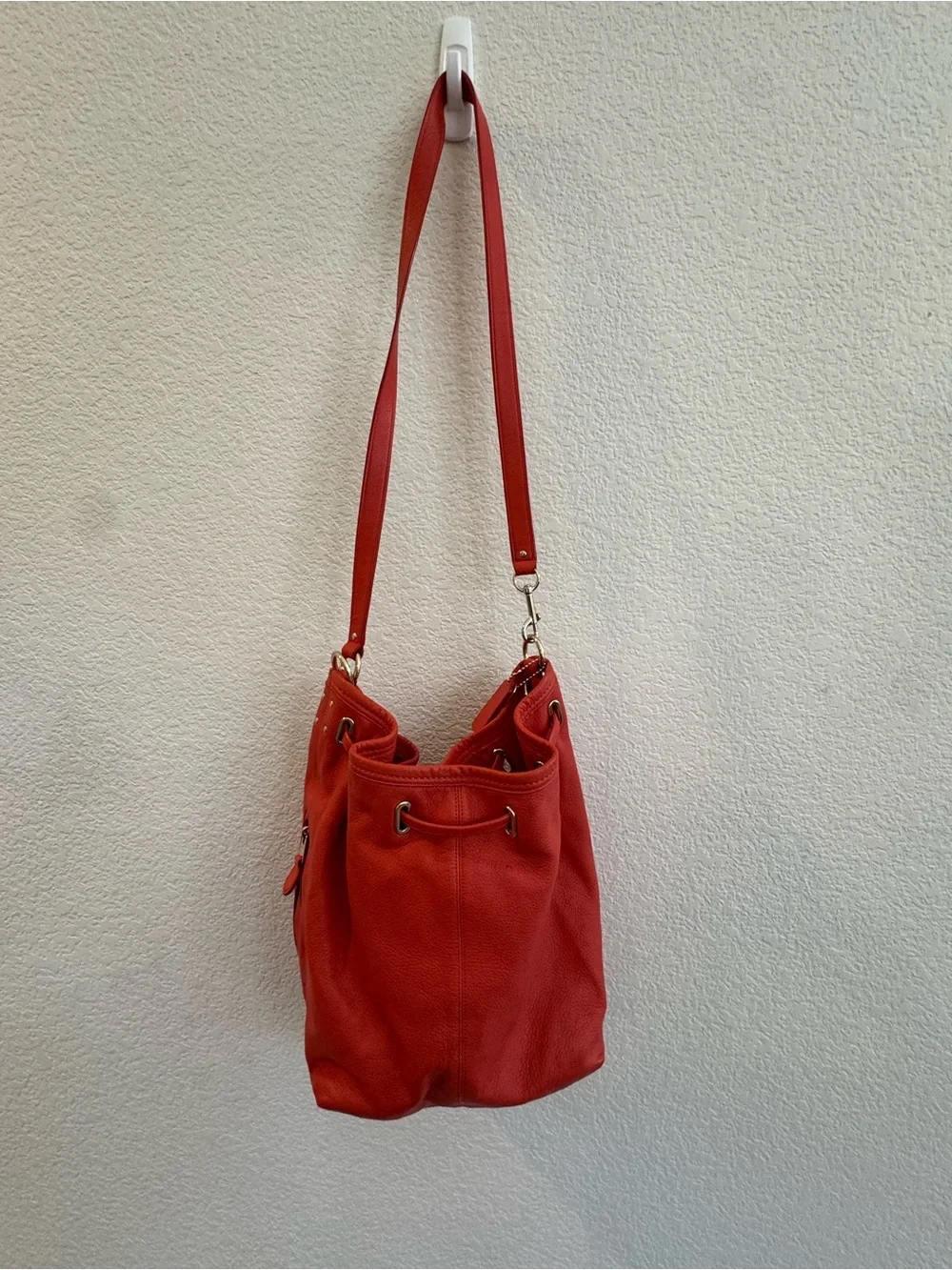 Coach Twist Lock Coral-Orange Pebbled Leather Drawstring Shoulder Bag
